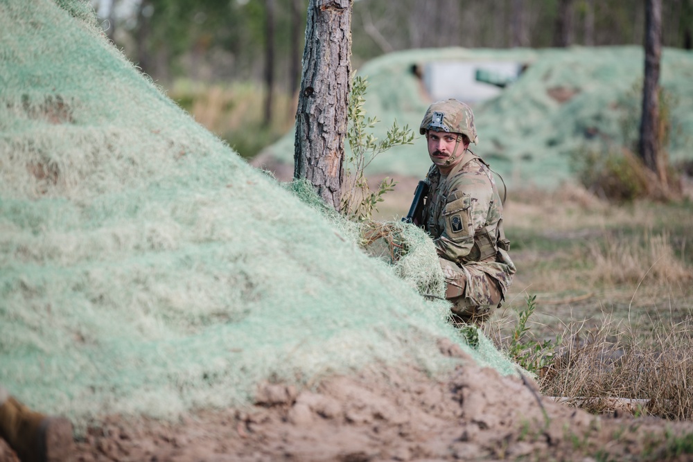 1-124 conducts squad tactics training