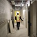 A Contractor Walks Through a Police Station Under Construction on Camp Blaz