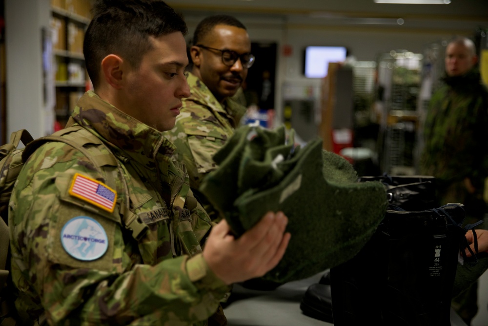 Virginia National Guard Soldiers receive Finnish gear and briefings during Arctic Forge 25