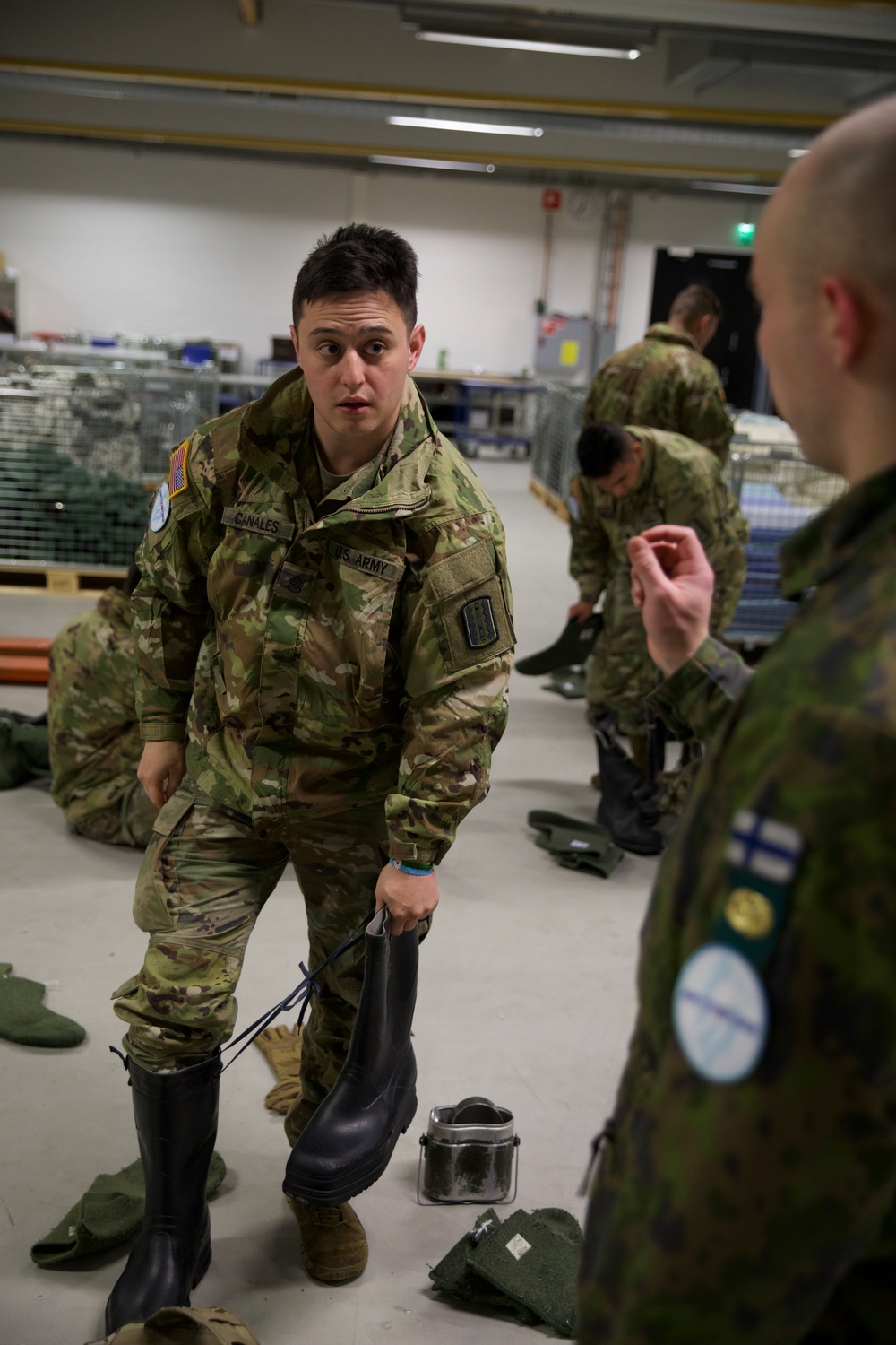 Virginia National Guard Soldiers receive Finnish gear and briefings during Arctic Forge 25