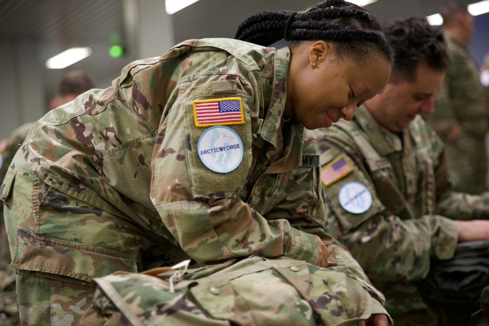 Virginia National Guard Soldiers receive Finnish gear and briefings during Arctic Forge 25