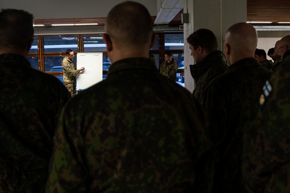 10th Mountain, 11th Airborne Division, Canadian and Finnish Soldiers Hold a Rehearsal of Concept Brief for Arctic Forge 25