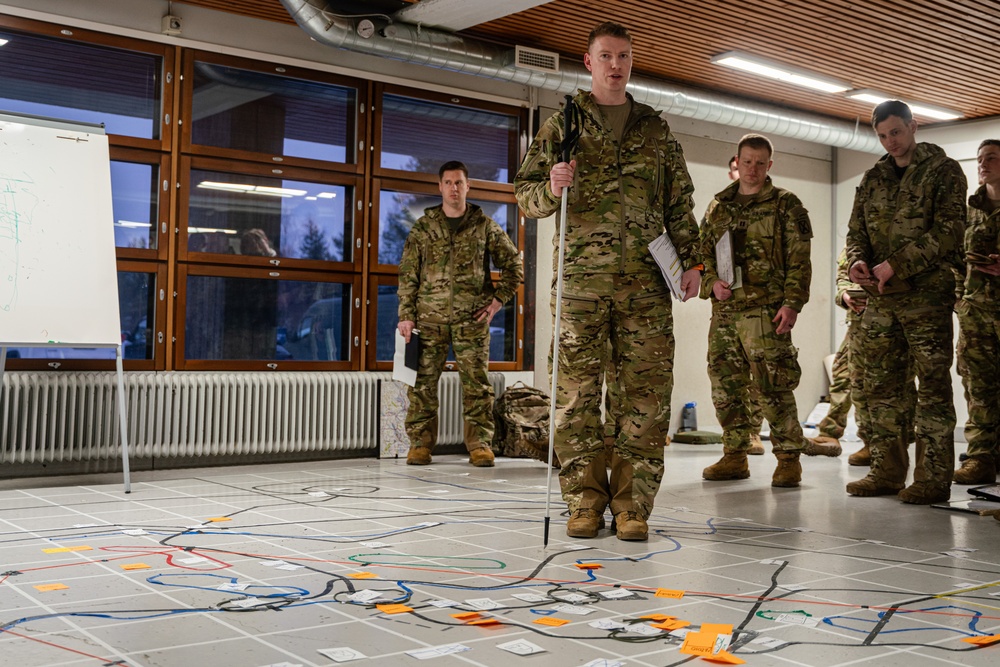 10th Mountain, 11th Airborne Division, Canadian and Finnish Soldiers Hold a Rehearsal of Concept Brief for Arctic Forge 25