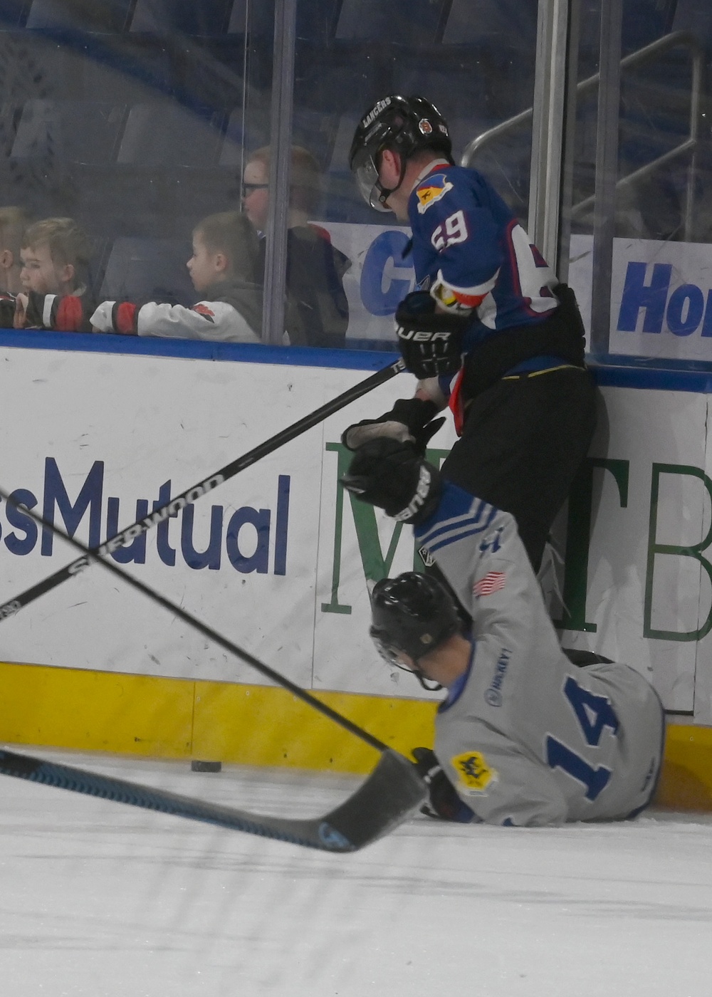 104th Fighter Wing hockey team competes in Battle of the Bases with rival 103rd Airlift Wing