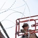 U.S. Marines mount concertina wire along southern border wall