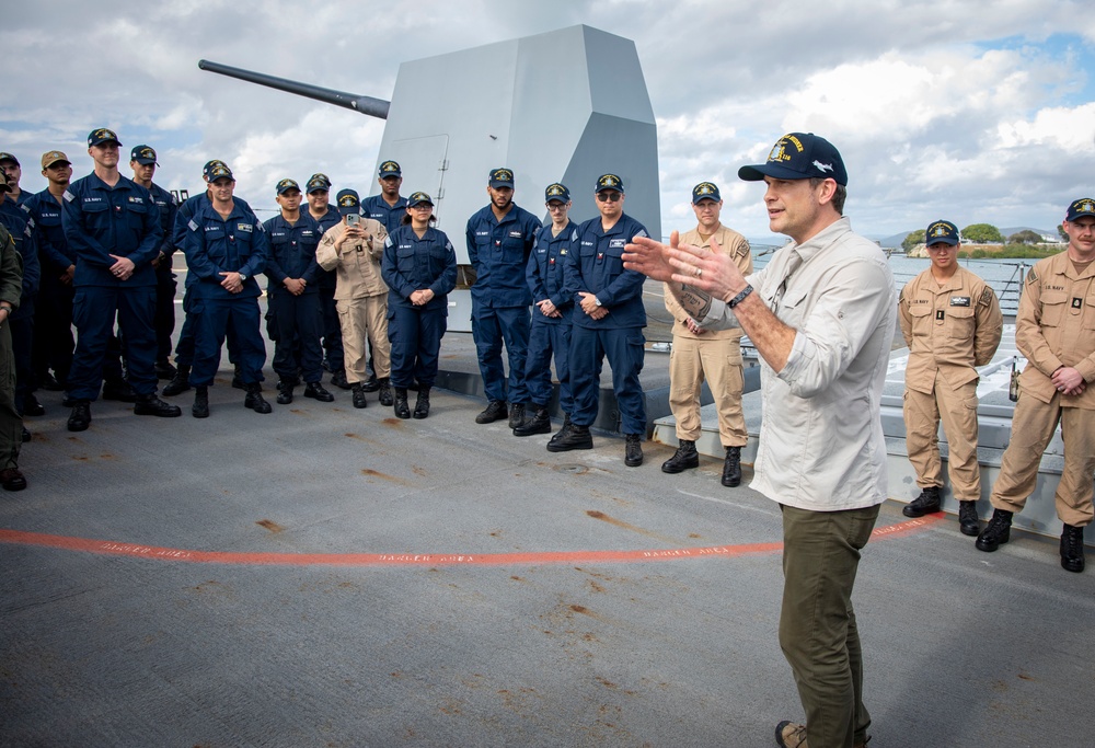 Secretary of Defense Pete Hegseth interacts with Sailors