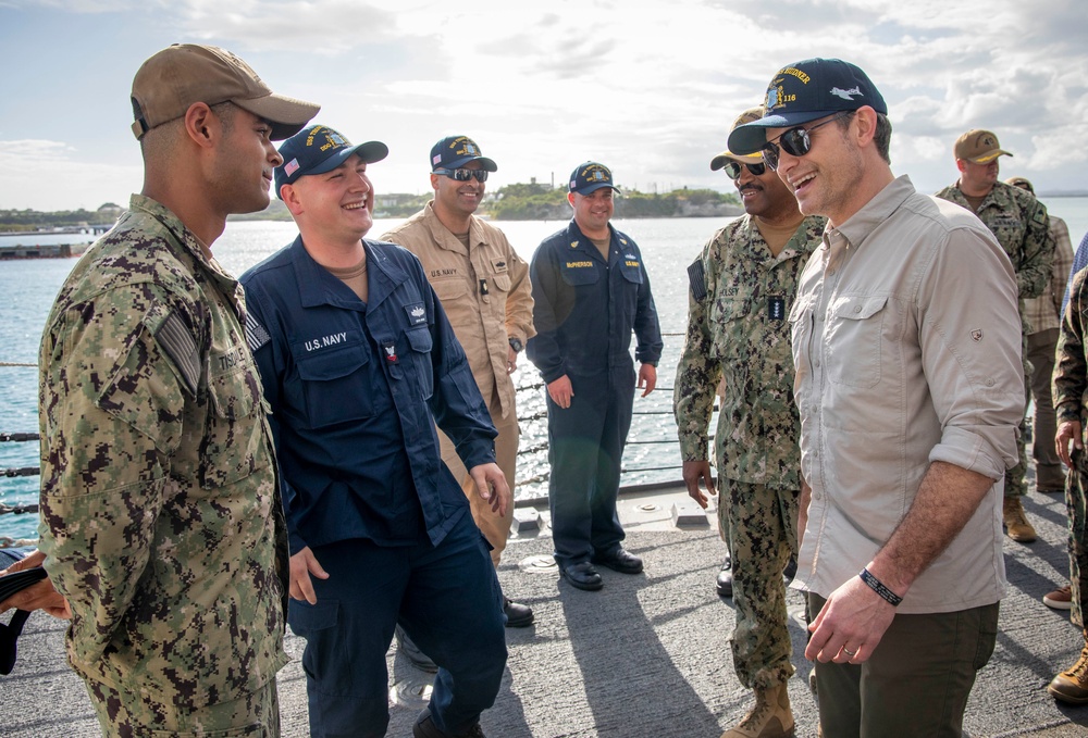 Secretary of Defense Pete Hegseth interacts with Sailors