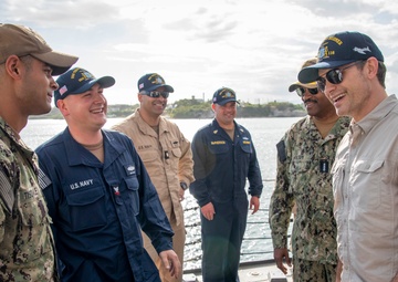 Secretary of Defense Pete Hegseth interacts with Sailors