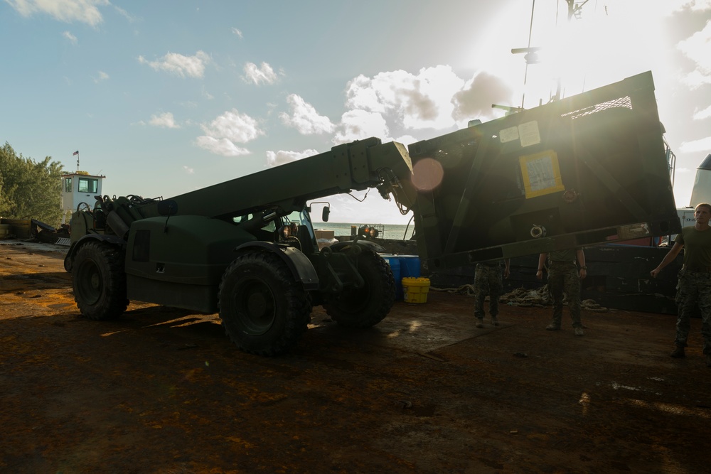 U.S. Marines with 2nd MAW offload equipment and supplies in the Bahamas