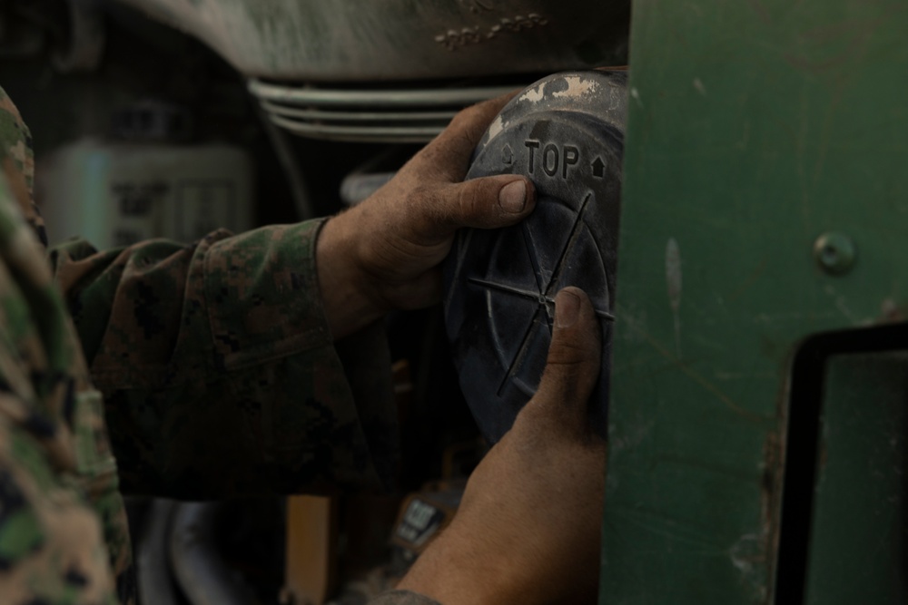 U.S. Marines with MWSS-272 perform preventative maintenance