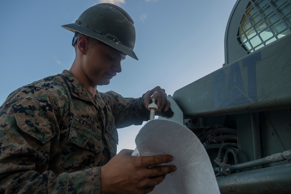 U.S. Marines with MWSS-272 perform preventative maintenance