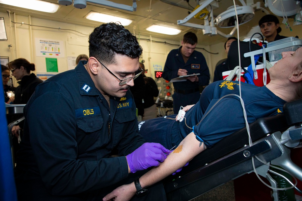 Sailors and staff with U.S. Fleet Forces, Naval Medical Forces Atlantic, and Naval Air Force Atlantic conduct Quality Medical Assist Visit aboard USS Gerald R. Ford (CVN 78)