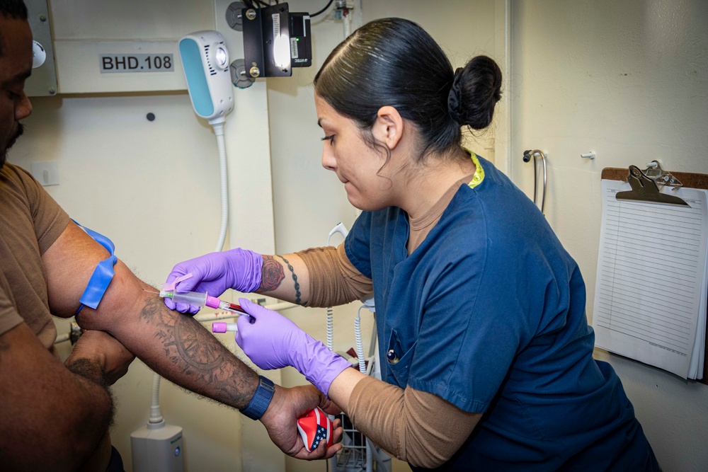 Sailors and staff with U.S. Fleet Forces, Naval Medical Forces Atlantic, and Naval Air Force Atlantic conduct Quality Medical Assist Visit aboard USS Gerald R. Ford (CVN 78)