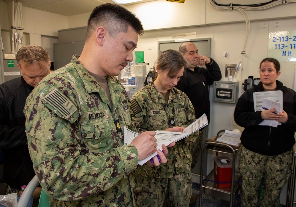 Sailors and staff with U.S. Fleet Forces, Naval Medical Forces Atlantic, and Naval Air Force Atlantic conduct Quality Medical Assist Visit aboard USS Gerald R. Ford (CVN 78)