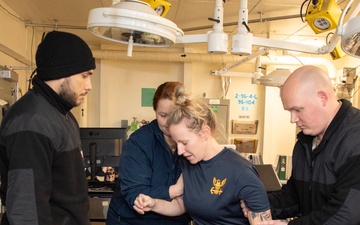 Sailors and staff with U.S. Fleet Forces, Naval Medical Forces Atlantic, and Naval Air Force Atlantic conduct Quality Medical Assist Visit aboard USS Gerald R. Ford (CVN 78)