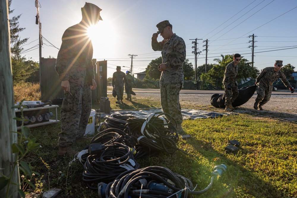 U.S. Marines and Sailors with II MEF engage in a medical and dental civil action program in The Bahamas