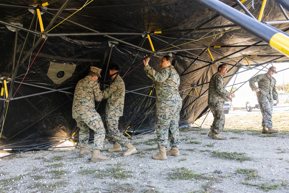 U.S. Marines and Sailors with II MEF engage in a medical and dental civil action program in The Bahamas