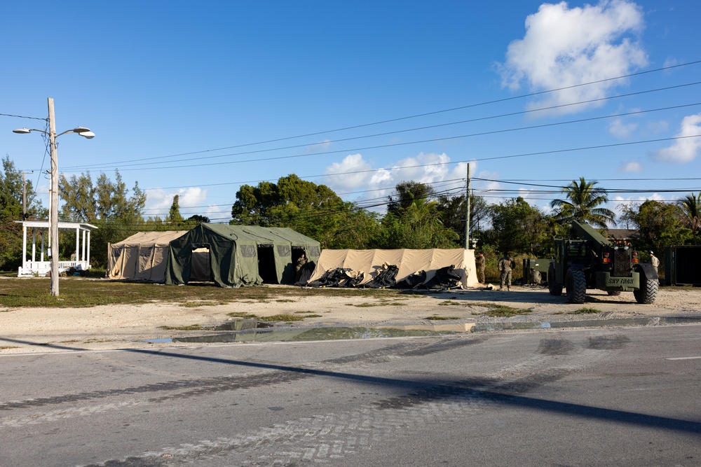 U.S. Marines and Sailors with II MEF engage in a medical and dental civil action program in The Bahamas