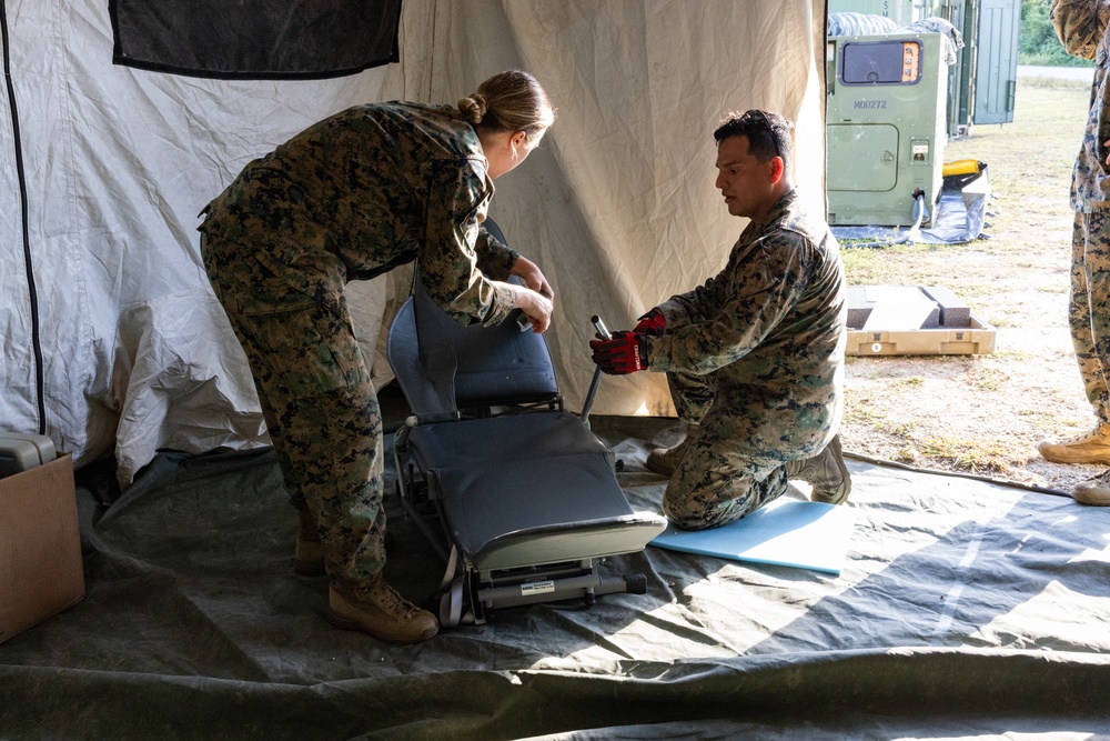 U.S. Marines and Sailors with II MEF engage in a medical and dental civil action program in The Bahamas