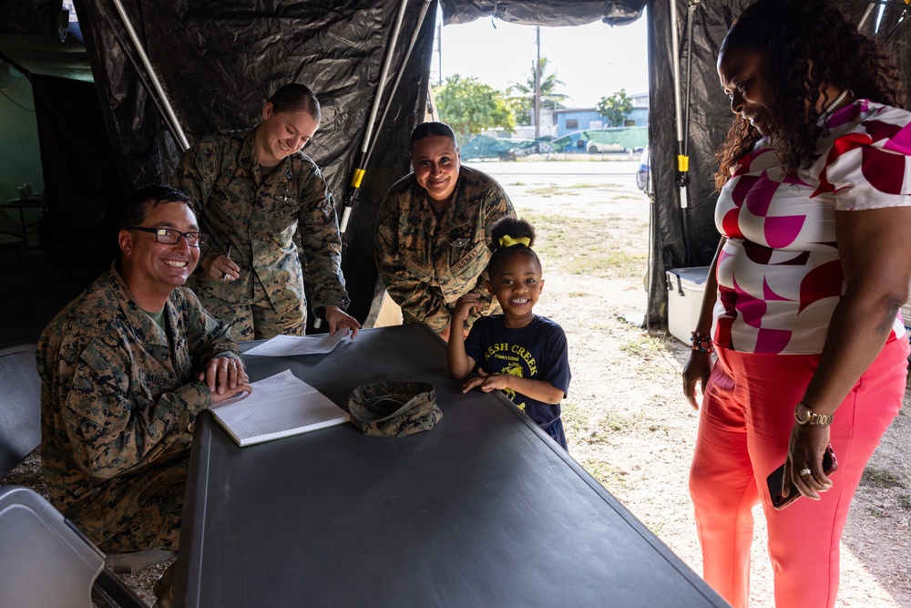 U.S. Marines and Sailors with II MEF engage in a medical and dental civil action program in the Bahamas