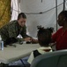 U.S. Marines and Sailors with II MEF engage in a medical and dental civil action program in The Bahamas