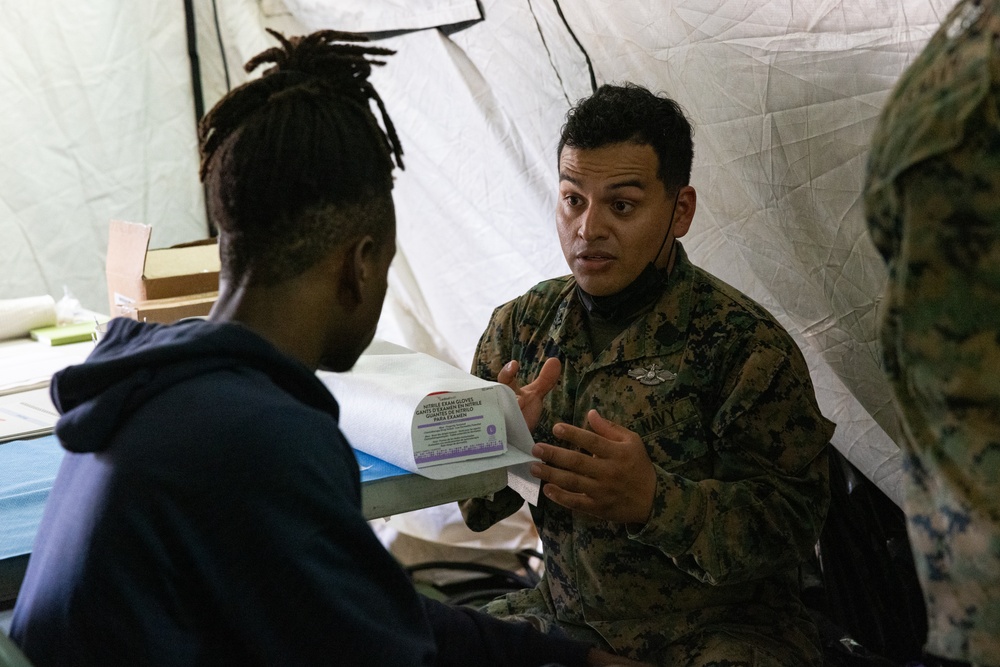 U.S. Marines and Sailors with II MEF engage in a medical and dental civil action program in The Bahamas