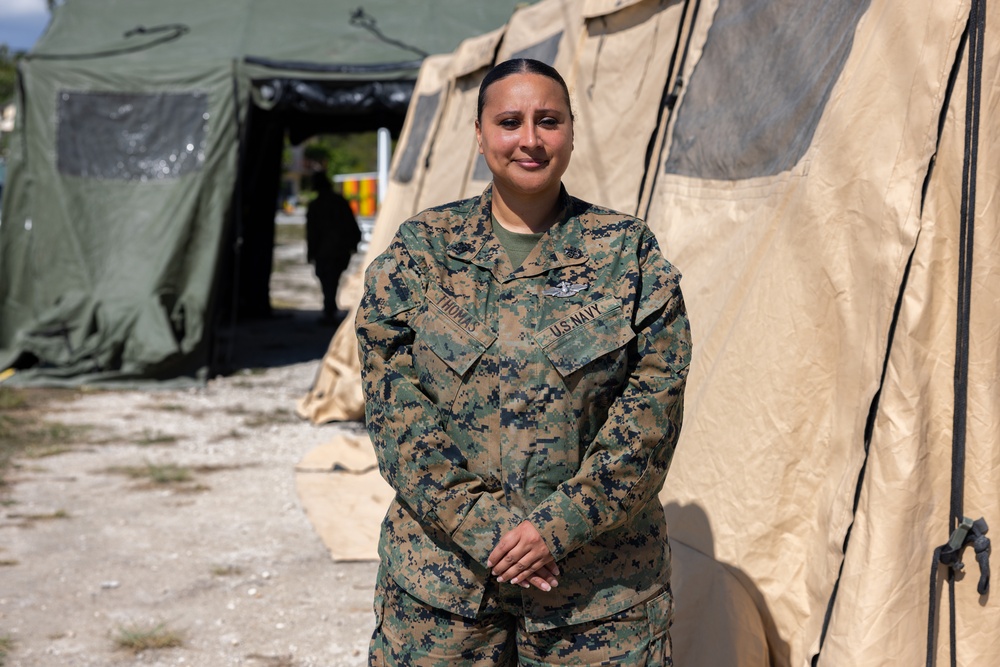 U.S. Marines and Sailors with II MEF engage in a medical and dental civil action program in The Bahamas