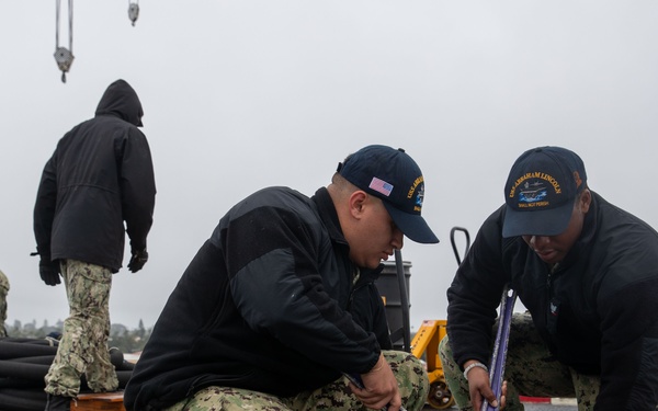 Abraham Lincoln conducts routine operations