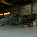 U.S. Marines with VMA-231 conduct maintenance on the AV-8B Harrier II