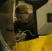 U.S. Marines with VMA-231 conduct maintenance on the AV-8B Harrier II