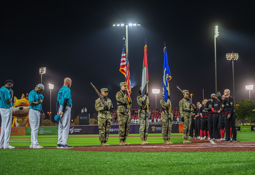 The 380th AEW Honor Guard presents the colors at a Baseball United game