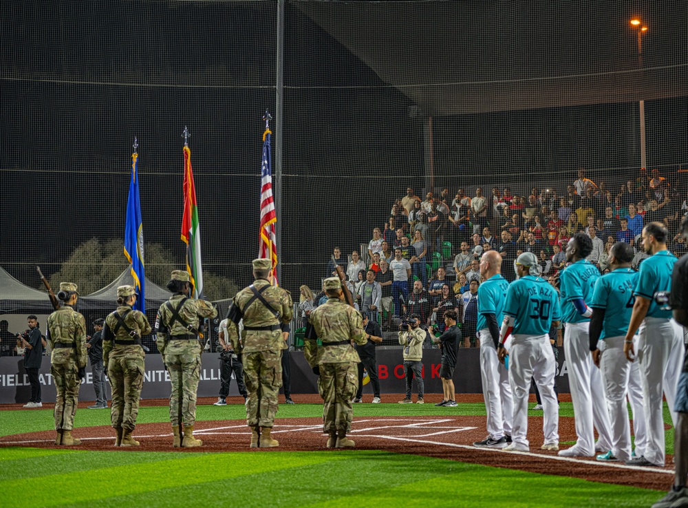 The 380th AEW Honor Guard presents the colors at a Baseball United game