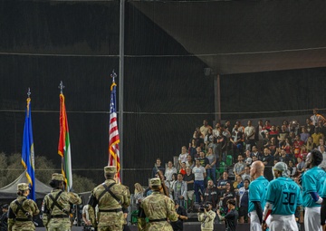The 380th AEW Honor Guard presents the colors at a Baseball United game