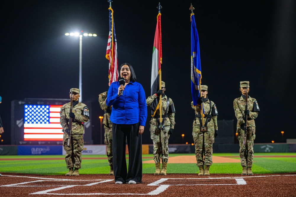 The 380th AEW Honor Guard presents the colors at a Baseball United game