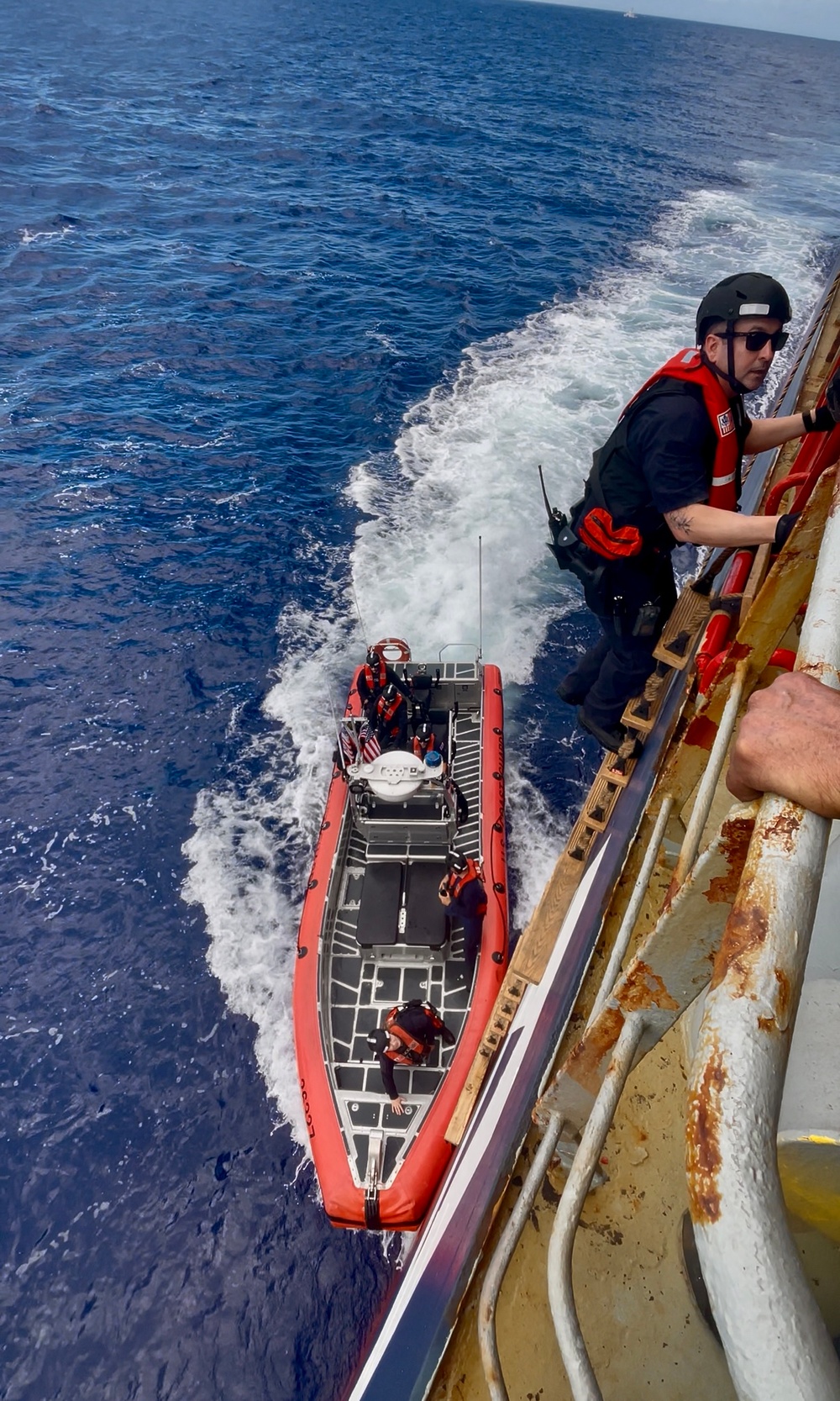 USCGC Myrtle Hazard (WPC 1139) crew conduct security boardings off Guam