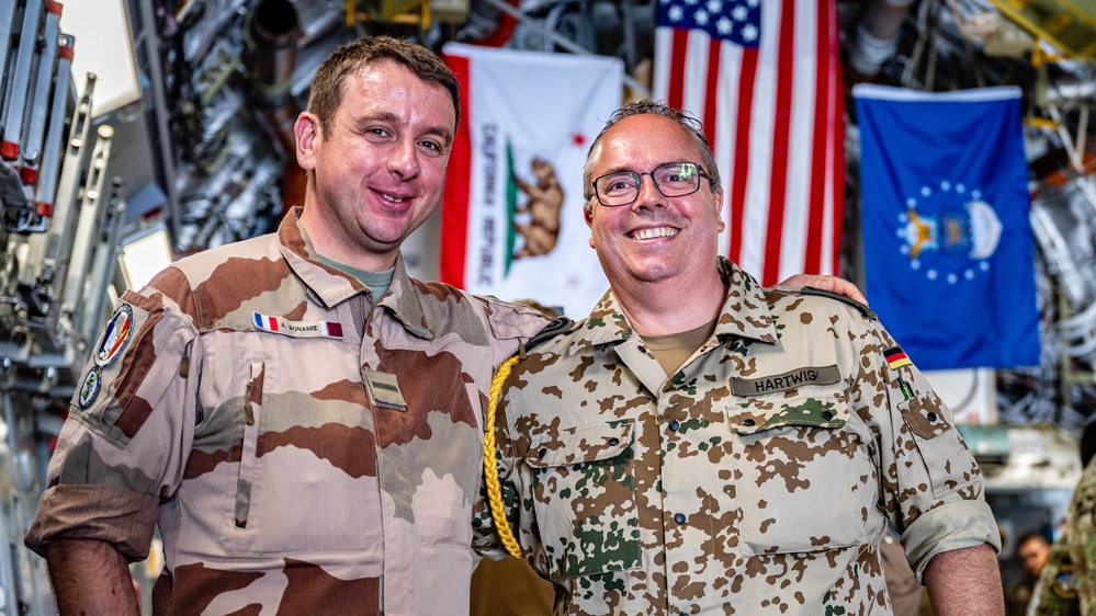 Combined Air Operation Center members attend a Pet the Jet event