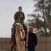 Airmen journey through the sands with a bazaar and camel riding