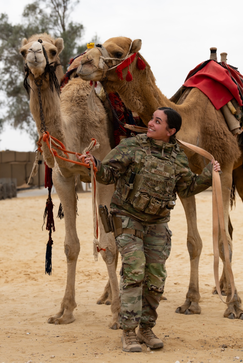 Airmen journey through the sands with a bazaar and camel riding
