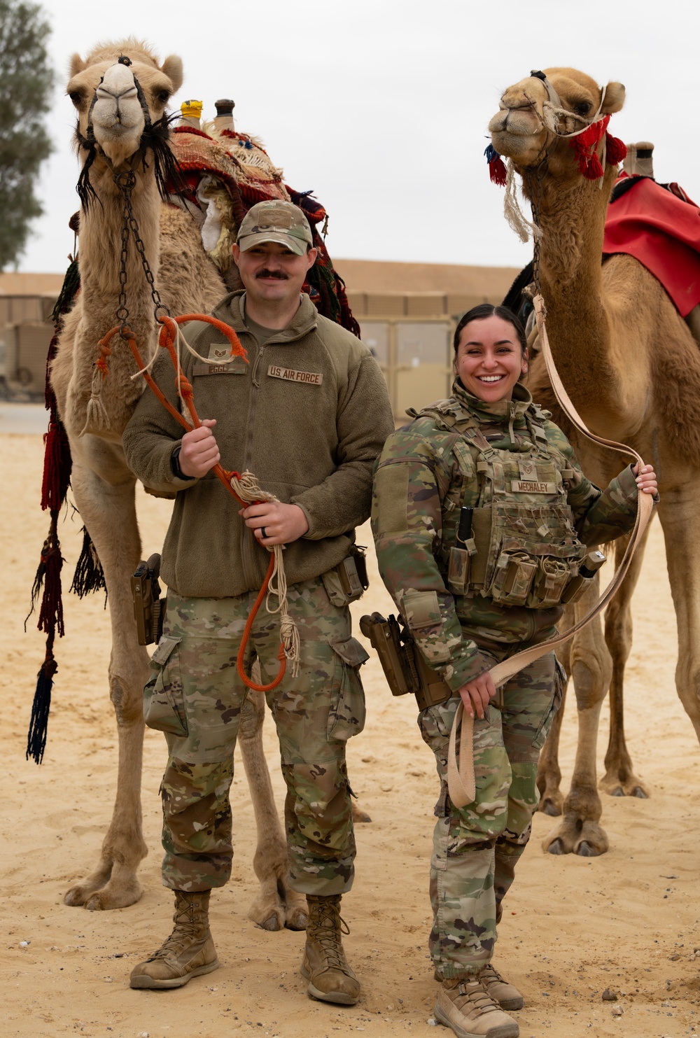 Airmen journey through the sands with a bazaar and camel riding