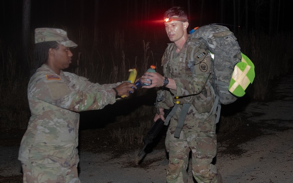12-Mile Ruck March Half-way Pitstop During Best Warrior