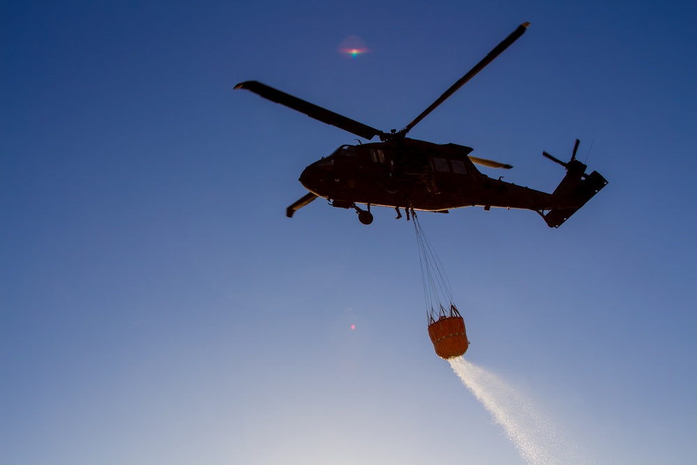 1-2 Stryker Brigade Soldiers Aboard UH-60 Black Hawk Deploy Bambi Bucket for Precision Fire Suppression - CALFEX 2025