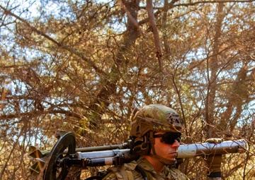 1-2 Stryker Brigade Mortar Crew Member Assesses Terrain to Identify Firing Positions - CALFEX 2025