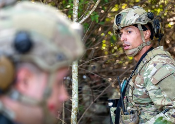 Airman Assesses the Situation During MOSAIC GECKO II