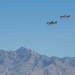 F-22 Raptor performs alongside two Tigers and a Falcon