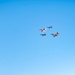 F-22 Raptor performs alongside two Tigers and a Falcon