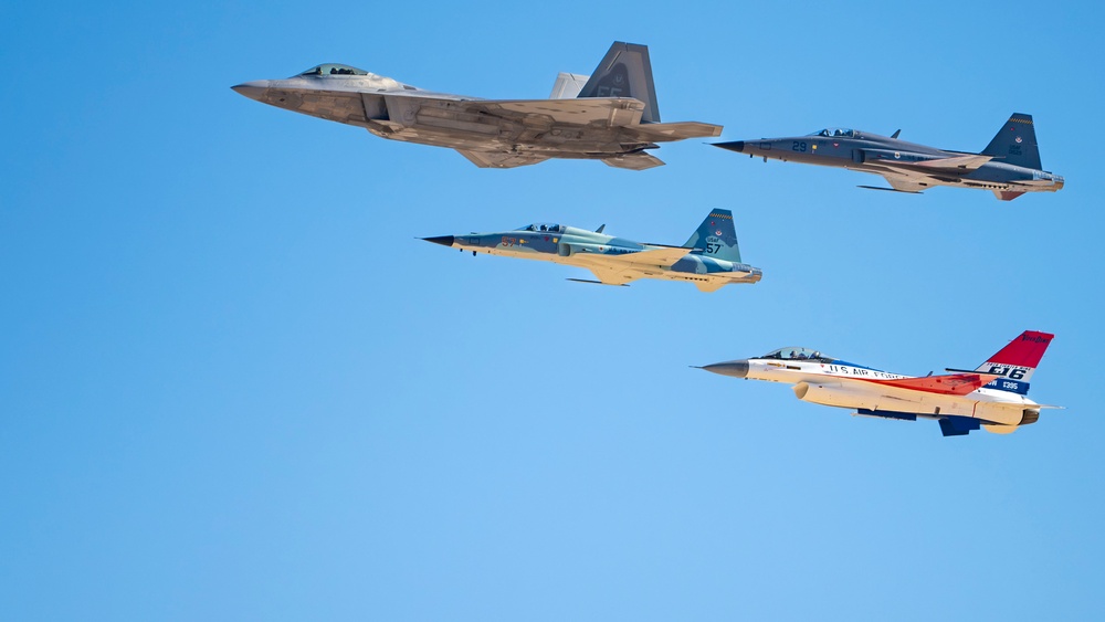 F-22 Raptor performs alongside two Tigers and a Falcon