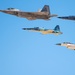 F-22 Raptor performs alongside two Tigers and a Falcon