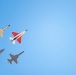 F-22 Raptor performs alongside two Tigers and a Falcon