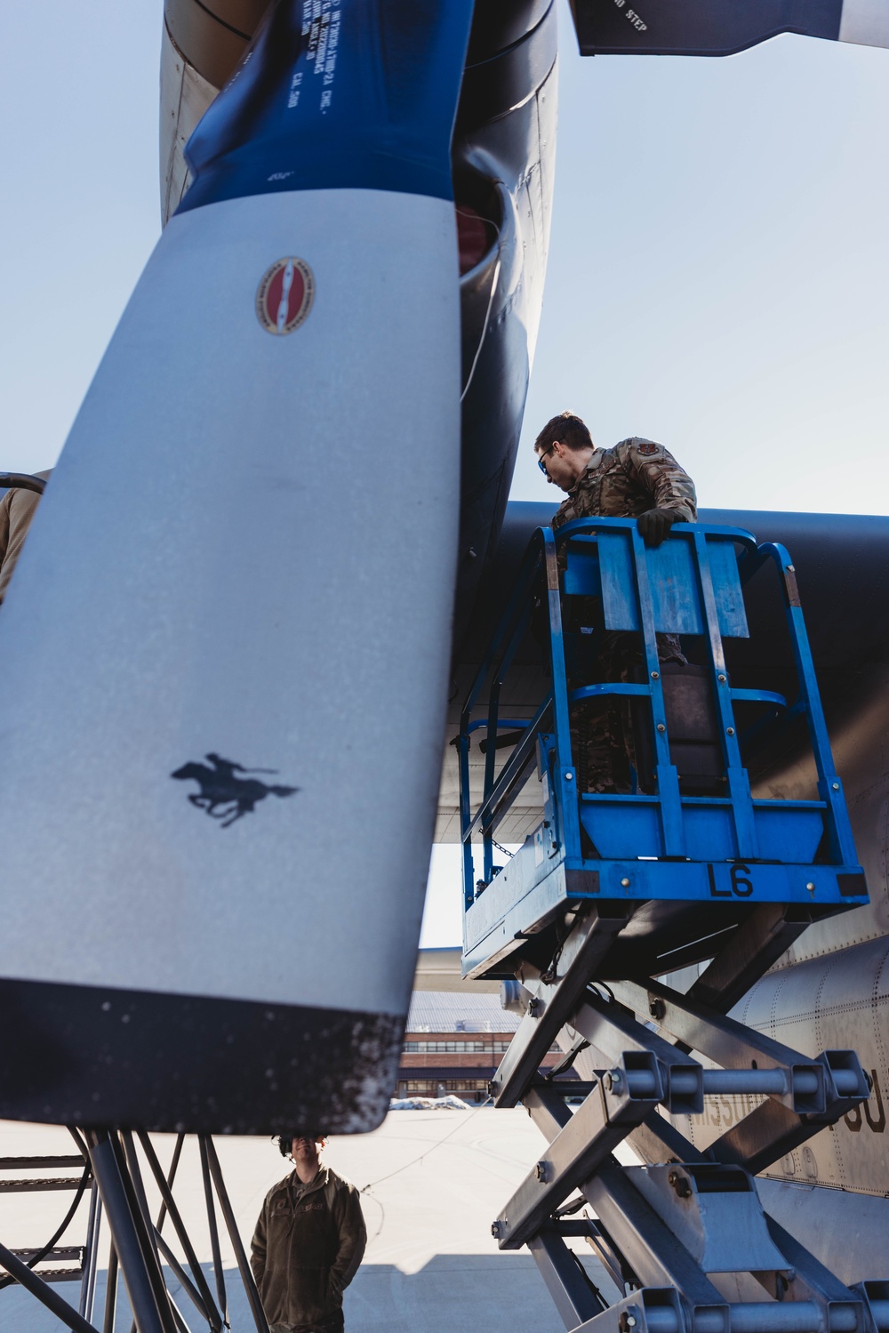 Airmen reassemble a C-130 Hercules engine