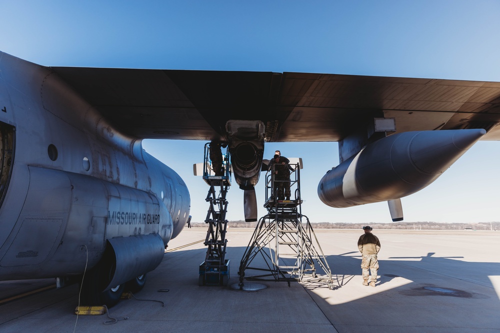 Airmen reassemble a C-130 Hercules engine